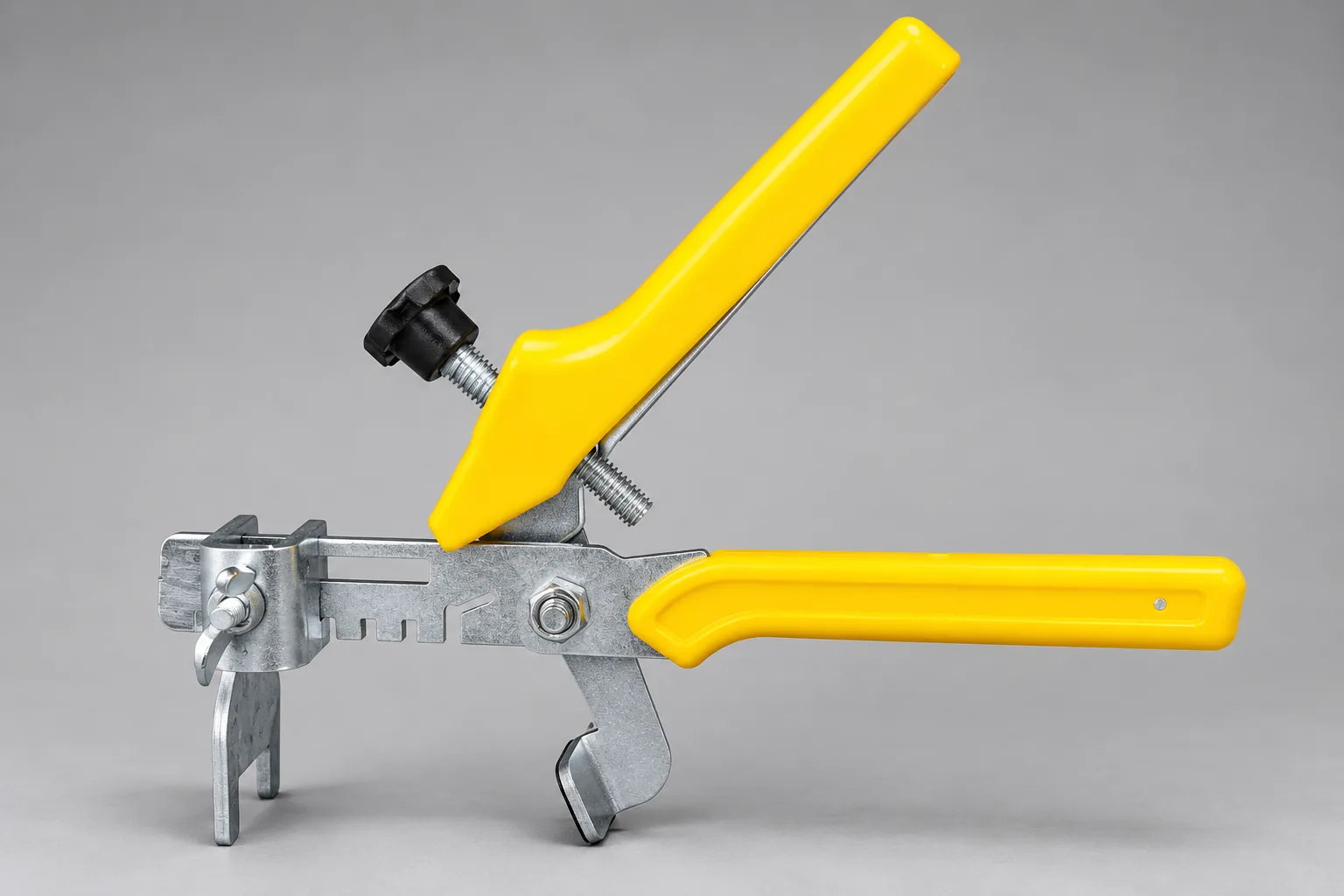 Tile leveling pliers with yellow handles, black screw knob and galvanised metal body