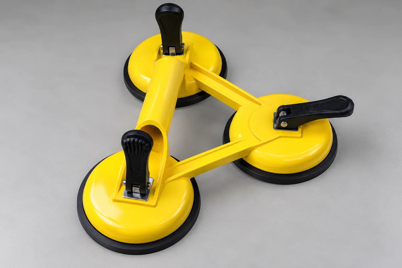 Yellow triple suction cup with three black lever locks